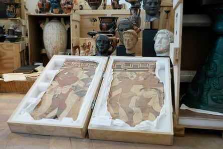 two pieces of art in a box