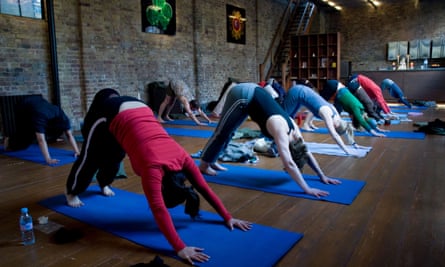 People doing yoga in a studio