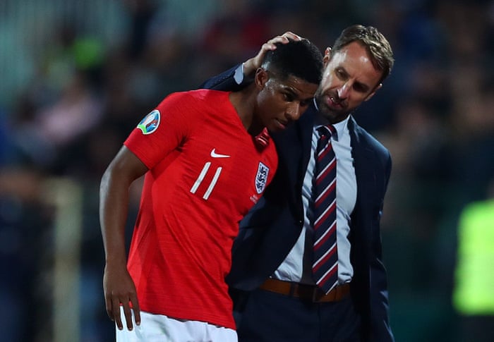 Marcus Rashford is congratulated by Gareth Southgate as he is substituted.