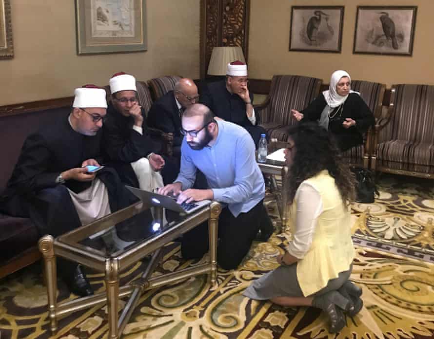 Aya Chebbi and Abdalaziz Alhamza with the deputy grand imam of al-Azhar, second from left, and his team