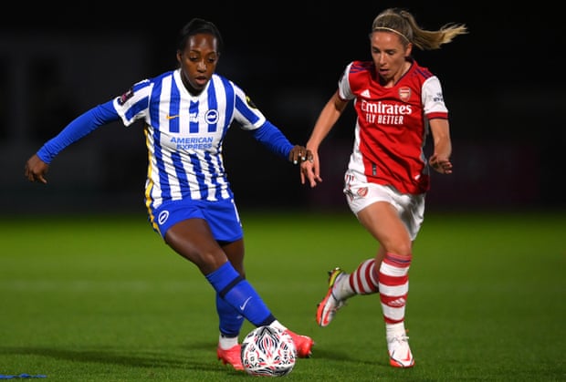 Danielle Carter (left), in action for Brighton last season against Arsenal, is heavily involved with the PFA.