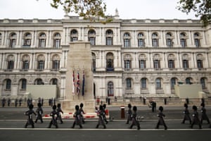 Members of the armed forces march past the Cenotaph during the Remembrance Sunday service in Whitehall, London