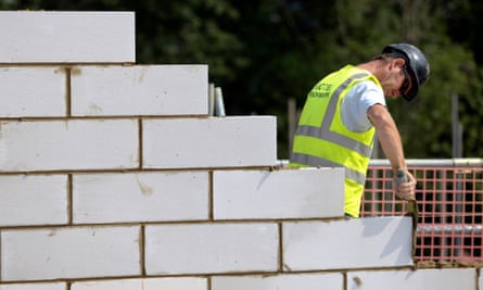 A bricklayer on a building site. Over the past year, almost three in four new jobs went to foreign nationals.