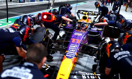 Red Bull’s pit lane engineers attend to Sergio Perez’s car in Las Vegas