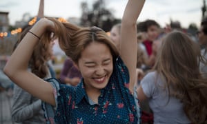a girl dancing outdoors