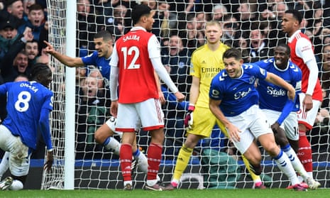 Everton's James Tarkowski peels away after heading the winner.
