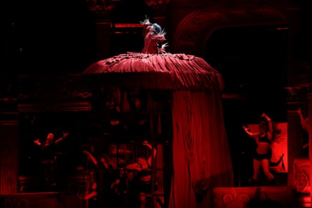 Lady Gaga performs in the red 'stage' dress