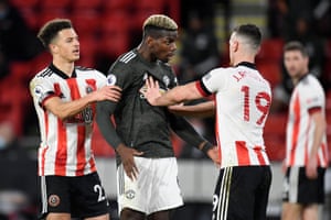 Paul Pogba and Jack Robinson clash.