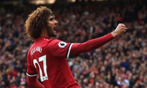 Marouane Fellaini celebrates scoring the second goal.