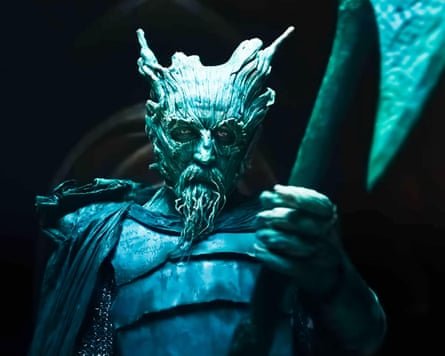 A monster in a cloak carrying an axe