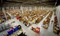 View from above of an Amazon ‘fulfilment centre’ in Wales with rows of stacked shelves