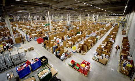 View from above of a warehouse with rows of stacked shelves