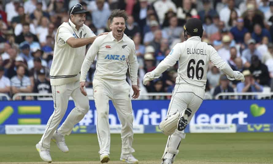 New Zealand’s Michael Bracewell, center, celebrates with teammates after dismissing England captain Ben Stokes.
