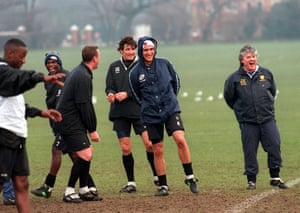 Wimbledon’s manager Joe Kinnear shares a joke with his players during training in 1996