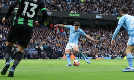 Julián Álvarez scores Manchester City’s first goal against Brighton.