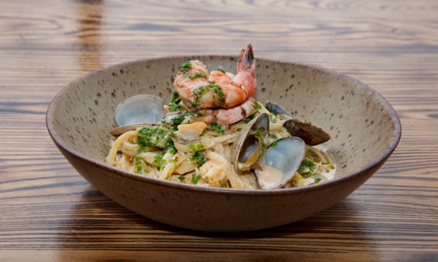 ‘A big old mess of brown and white crab meat, prawns and mussels’: seafood linguine.