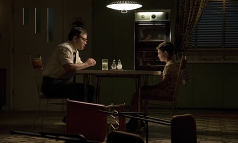 This image released by Paramount Pictures shows Matt Damon, left, and Noah Jupe in a scene from “Suburbicon.” ( Hilary Bronwyn Gayle/Paramount Pictures via AP)