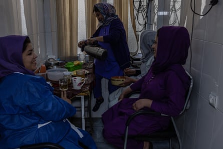 Nurses and midwives working in the prenatal ward at Rabia Balkhi hospital in Kabul sit down for lunch