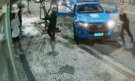 Security footage shows police apprehending teenagers in Brazil on 3 July.