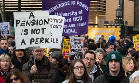 People protest in support of a lecturers’ strike over pensions cuts in March 2018.
