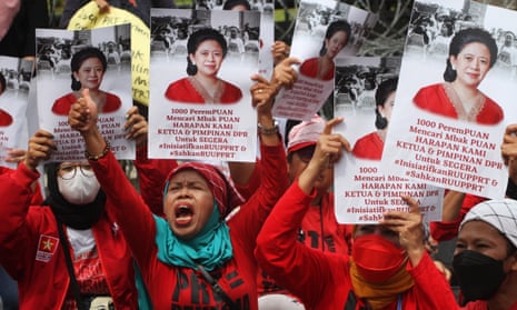 Dozens of activists join domestic workers outside the parliament building in Jakarta, Indonesia, to commemorate IWD and demand lawmakers pass the long-awaited bill to protect domestic workers.