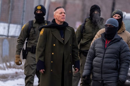 US border patrol official Gregory Bovino walks with federal agents in January.