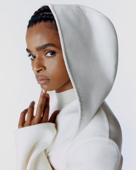 Portrait of Ramla Ali in white coat with hood