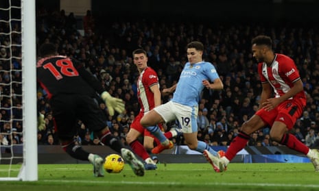 Manchester City’s Julian Alvarez scores their second goal.