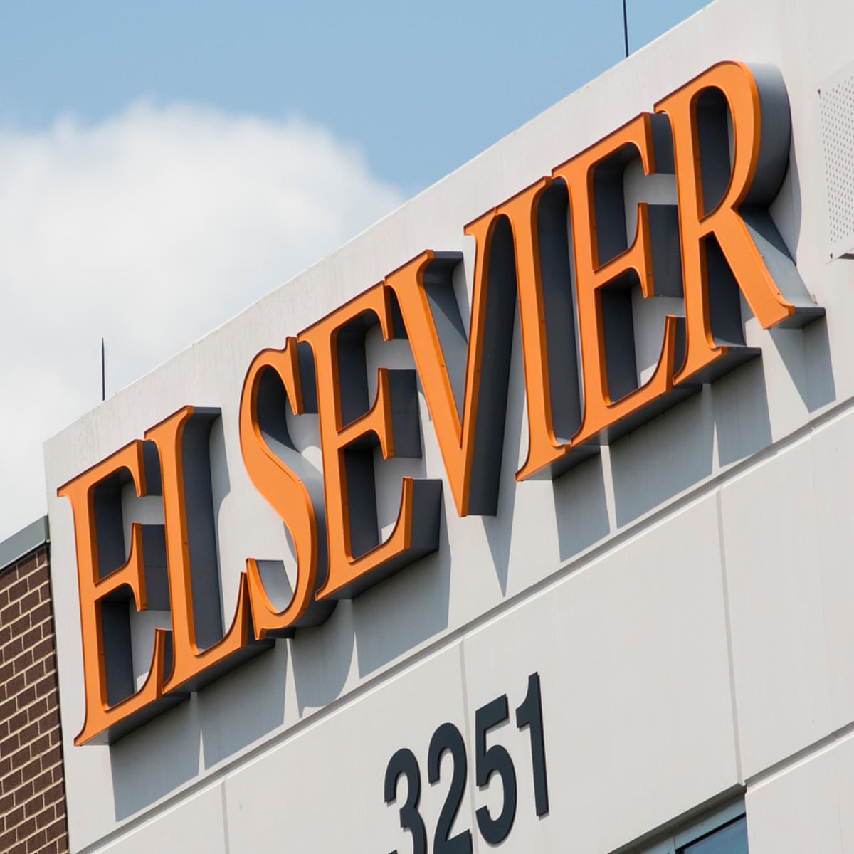 Elsevier Building Image Bangunan Elsevier Dengan Logo Nama Elsevier Besar Bold Warna Oren