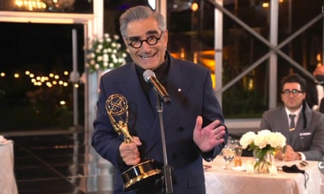 Eugene Levy accepts the Emmy for best actor in a comedy series at a remote location with his cast mates from Schitt’s Creek, which swept the comedy awards with seven wins. 