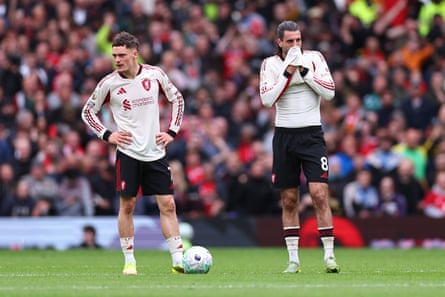 Florian Wirtz and Dominik Szoboszlai look dejected against Manchester United