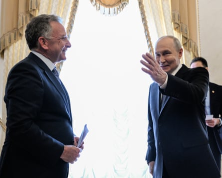 Steve Witkoff and Vladimir Putin standing together.