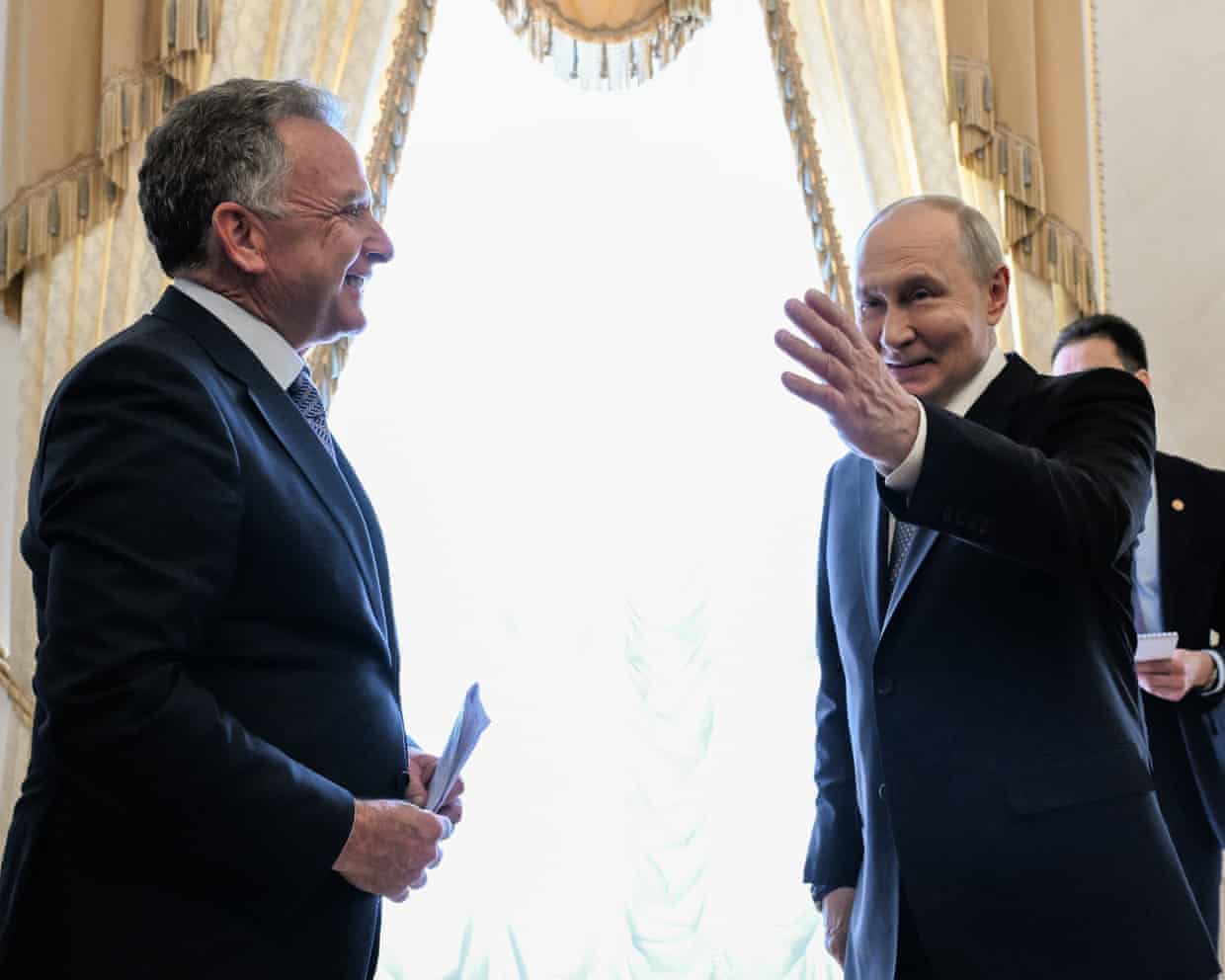 Steve Witkoff and Vladimir Putin standing together.
