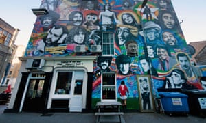Exterior of the Prince Albert pub in Brighton, showing its colourful mural of artists, musicians and celebrities.