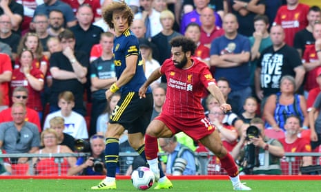David Luiz (left) struggles to keep tabs on Mohamed Salah at Anfield.