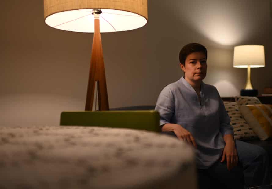 Solomiya Rozhko sitting on a chair in her mother’s apartment