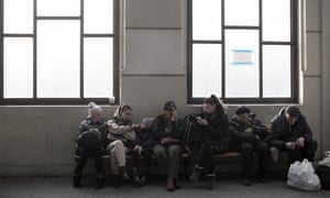 Ukrainian displaced civilians wait in the train station as they flee from the war in Lviv, Ukraine on March 15, 2022.