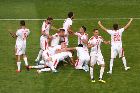 Kolarov celebrates with teammates.