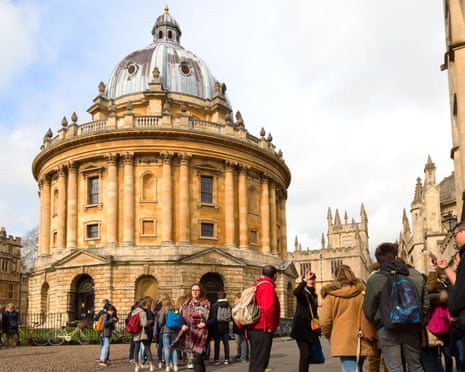Students at the Radcliffe Camera, Oxford city centre.