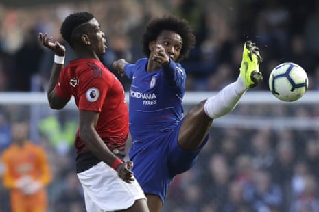 Chelsea’s Willian controls the ball away from Pogba.