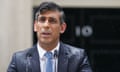 Prime Minister Rishi Sunak speaking in the rain outside 10 Downing Street, London on 22 May 2024.