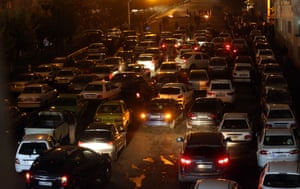 Drivers switch off engines to block main streets of Tehran during a demonstration against a government decision to hike petrol prices, in Tehran.