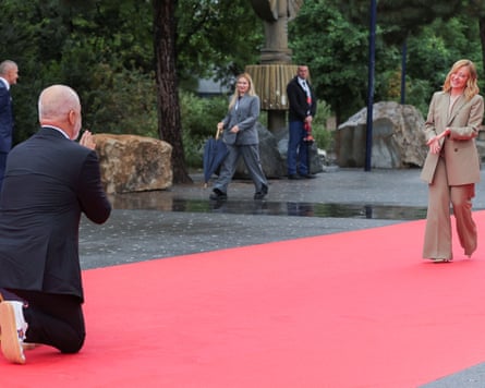 Edi Rama goes down on knee as he welcomes Giorgia Meloni on red carpet during EPC aummit in Tirana in May.