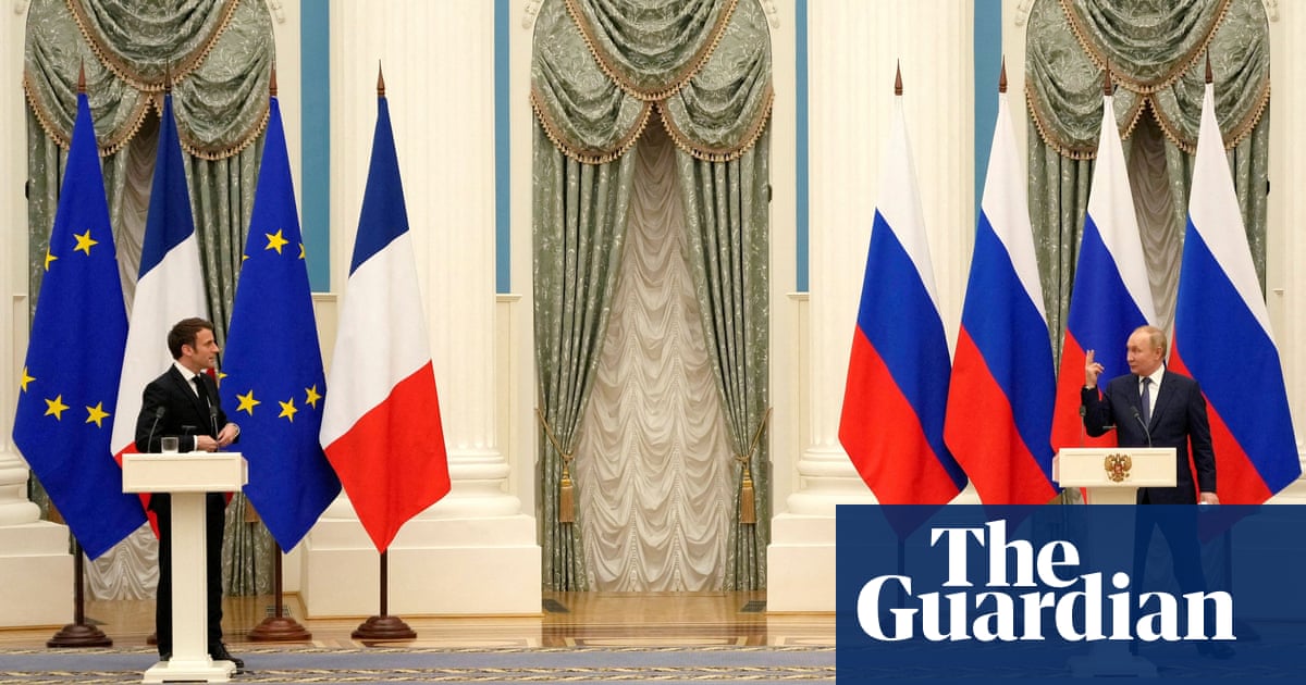 Macron was kept away from Putin in Kremlin for 'refusing Russian Covid test' | Emmanuel Macron | The Guardian
