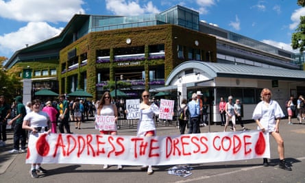Campaigners from Address The Dress Code outside the main gate at Wimbledon protest over its all white dress code while women are on their period, on day thirteen of the 2022 Wimbledon Championships at the All England Lawn Tennis and Croquet Club, Wimbledon. Picture date: Saturday July 9, 2022.