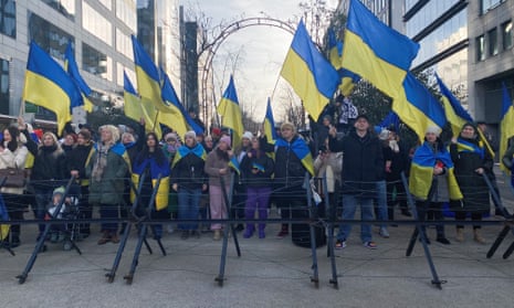 Ukrainians gather near the venue of the European summit to support the visit of Zelenskiy.