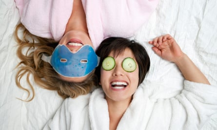 Women in bathrobes with eye masksGettyImages-138300747