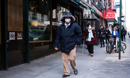 People wearing masks in New York on Friday.
