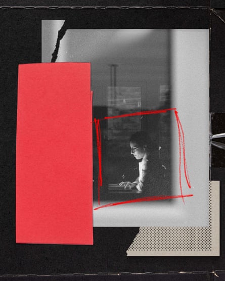 A woman typing at a computer