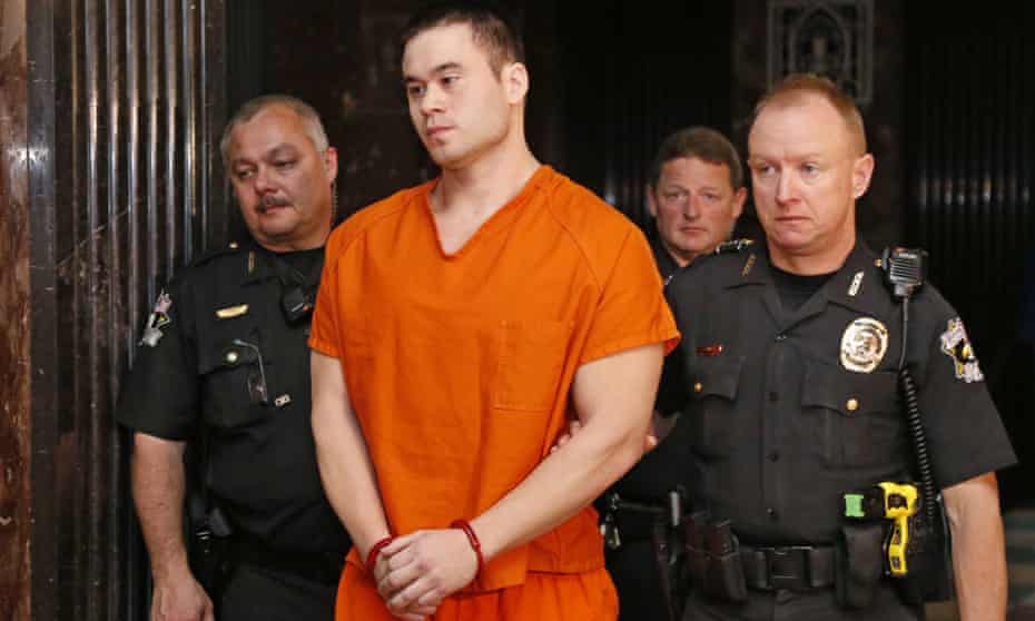 Daniel Holtzclaw is led from a courtroom in Oklahoma City last month.